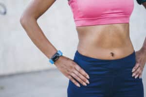 A cropped shot of a woman's torso after EvolveX treatments in Temecula, CA